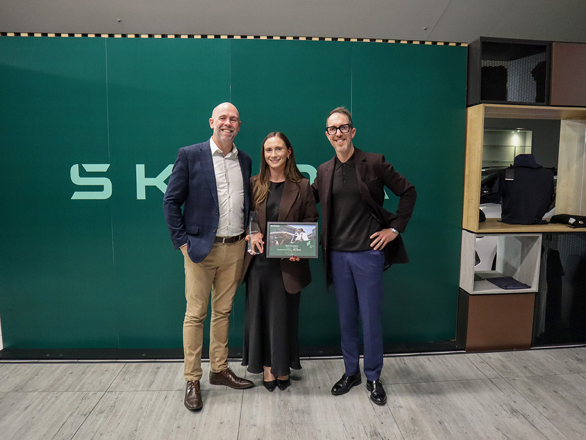 Miles Skoda receiving Customer Excellence Award