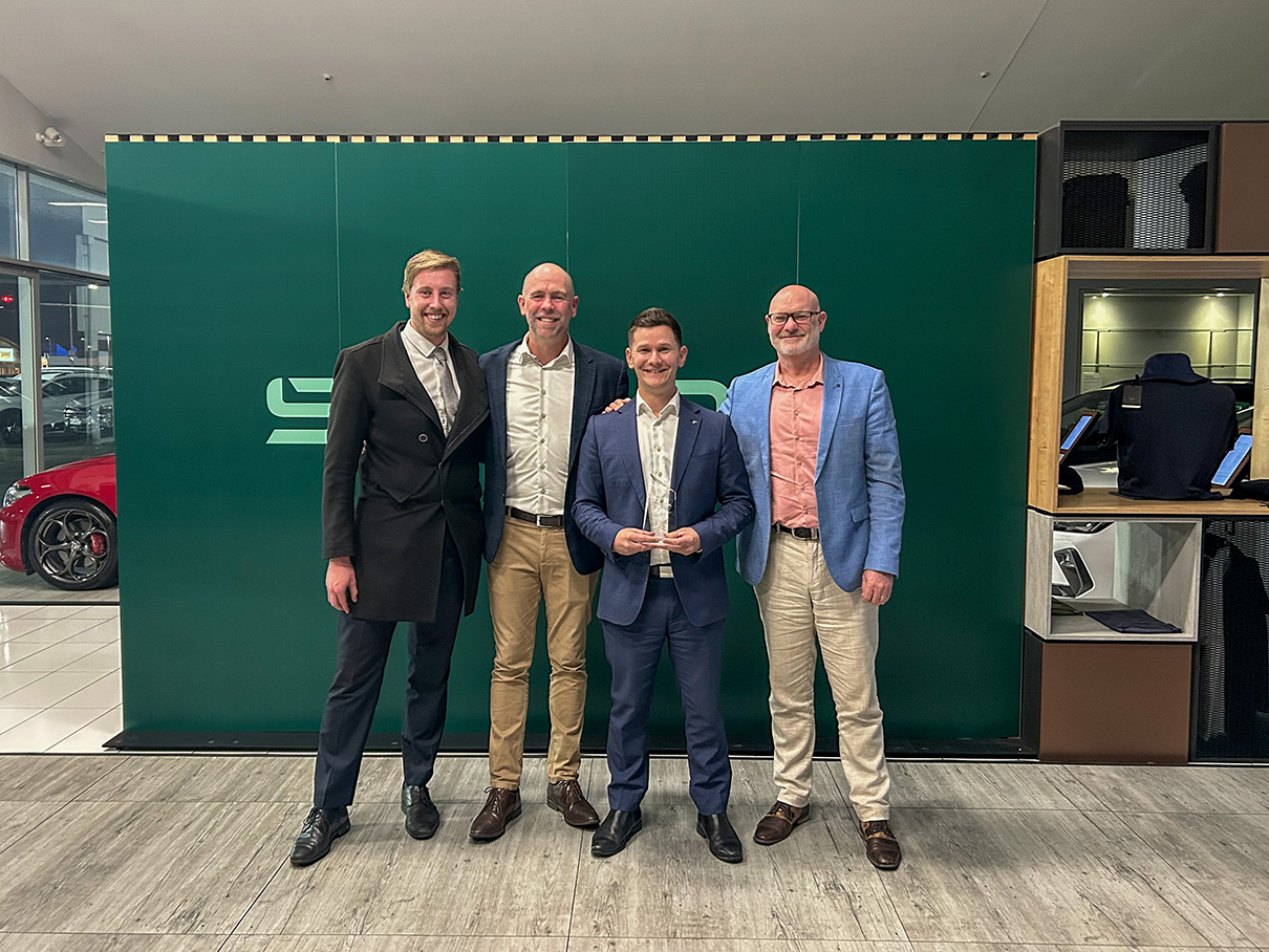Miles Skoda receiving Sales Team of the Year