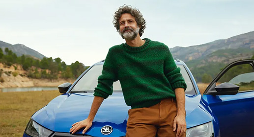 Man standing by Skoda Octavia